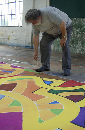 Tom painting the floorcloth for the Magic Flute